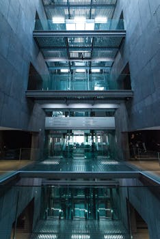 pexels-photo-1652542-1652542 Modern glass elevator inside a stylish architectural building in Vienna.